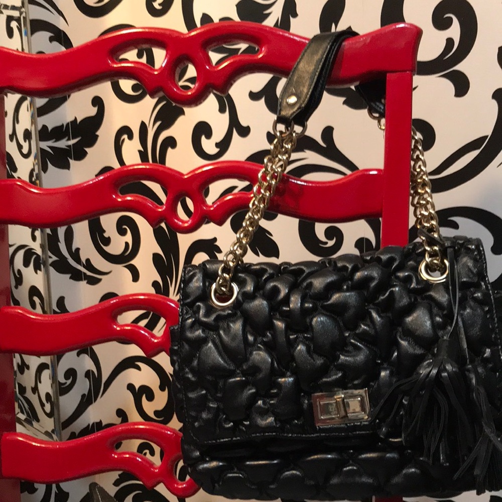 Black quilted purse with gold chain straps